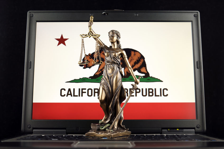 symbol of law and justice on laptop for California law