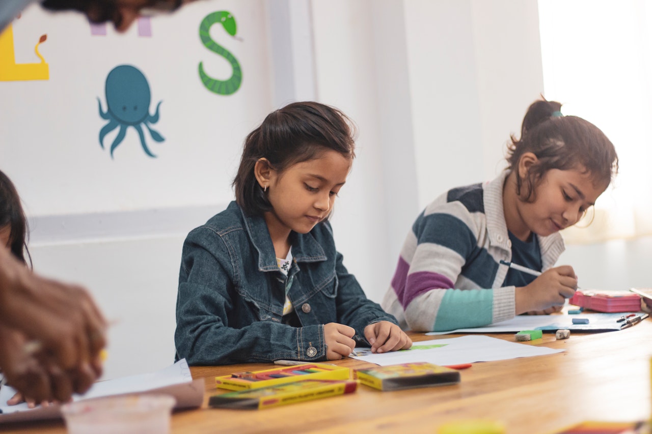 two female students doing homework