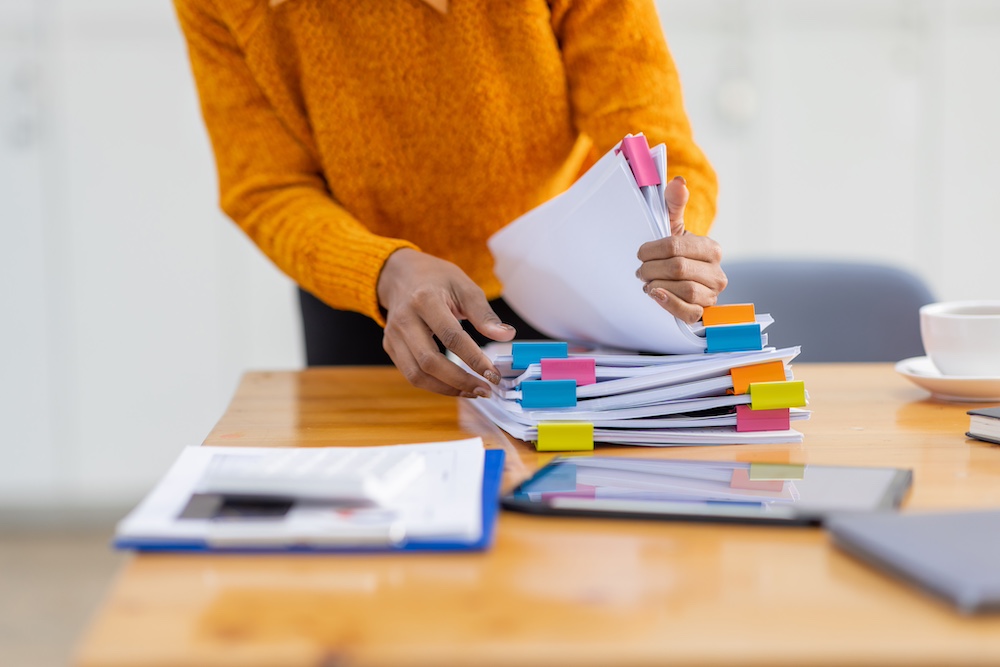 office worker handling documents